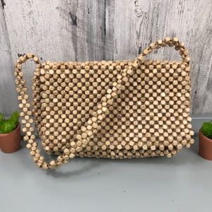 The Sak Woven Wooden Beaded Shoulder Bag Purse